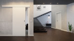 Schiebetür Weiß RAL 9010 CPL - Interio mit vor der Wand laufendem System im Wohnzimmer
