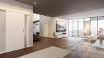 Blick in Wohnmilieu mit Schiebetür Weißlack RAL 9010 Premium in der Wand laufend