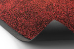 Detailbild mit gerollter Ecke von Fußmatte KLASSIK Nylonfaser 652 rot meliert - Entrada